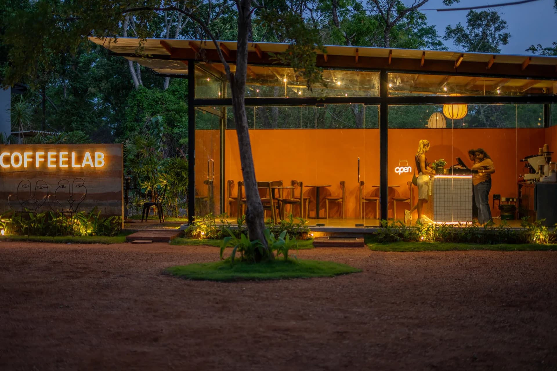 CoffeeLab Sigiriya illuminated in the evening